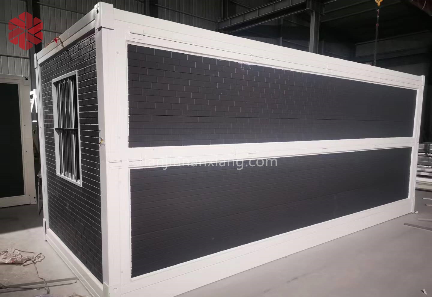 Black wall panels with a white frame and fully galvanized panels