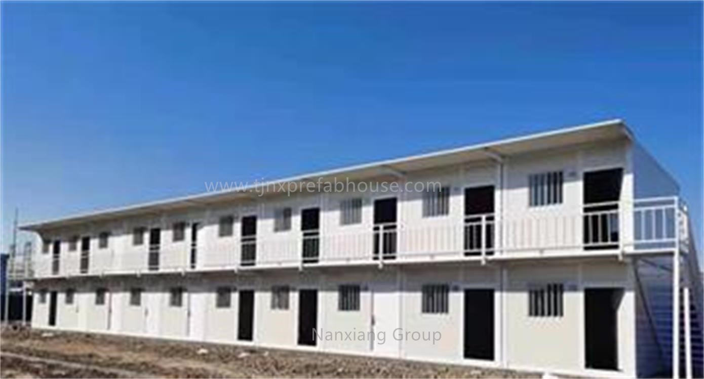 A folding container house being used as a warehouse on a construction site.